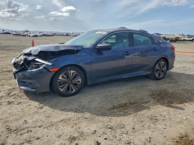 HONDA CIVIC EX 2017 with VIN 2HGFC1F32HH640356 - Photo from auction