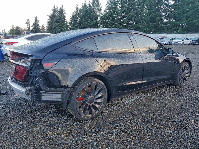 Photo 3 from auction – 2021 TESLA MODEL 3 with VIN 5YJ3E1ECXMF999323