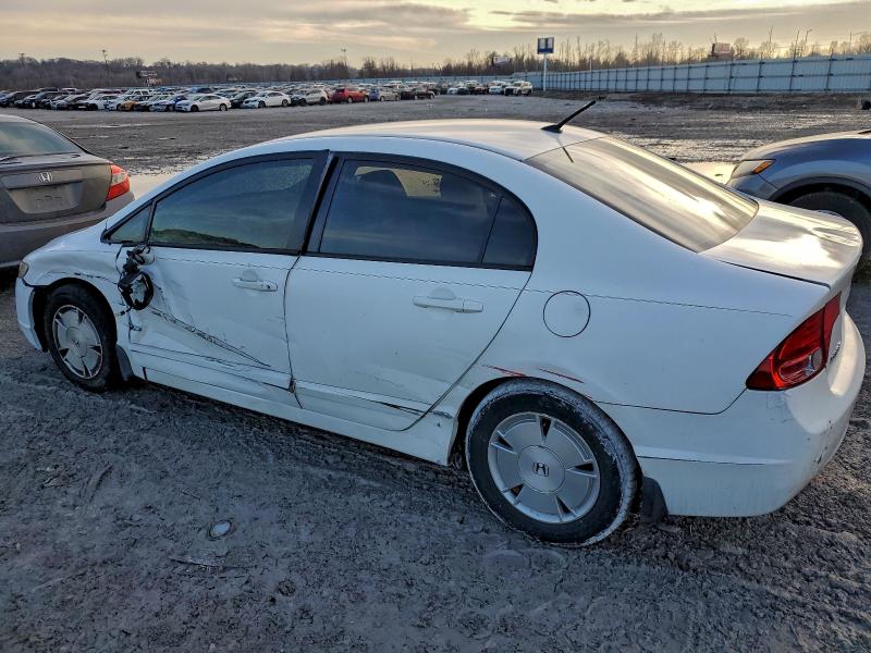 Photo 2 from auction – 2006 HONDA CIVIC HYBR with VIN JHMFA36246S006090