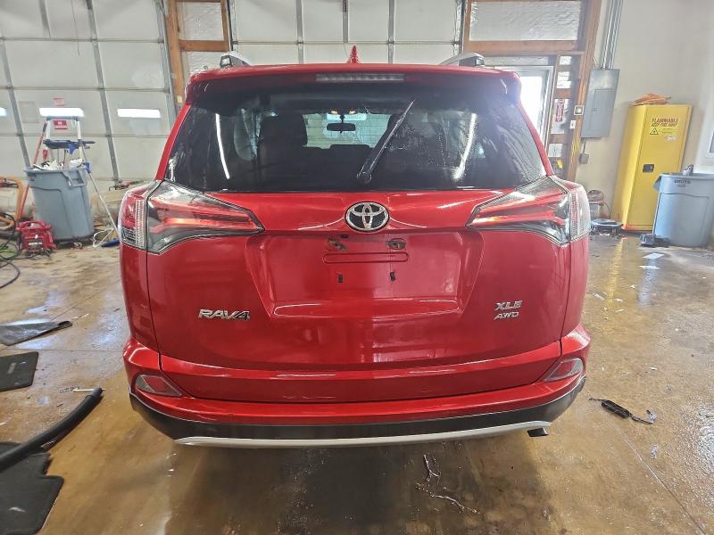 Photo 6 from auction – 2016 TOYOTA RAV4 XLE with VIN 2T3RFREV1GW474883