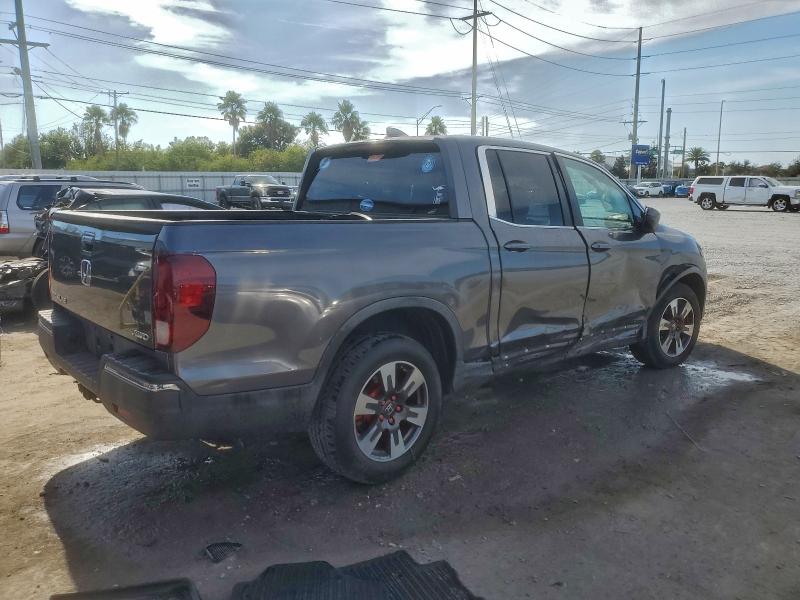 Photo 3 from auction – 2017 HONDA RIDGELINE with VIN 5FPYK3F57HB023037