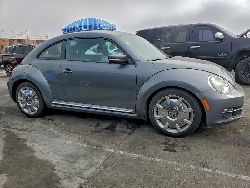 Photo 4 from auction – 2012 VOLKSWAGEN BEETLE with VIN 3VWJP7AT9CM651093