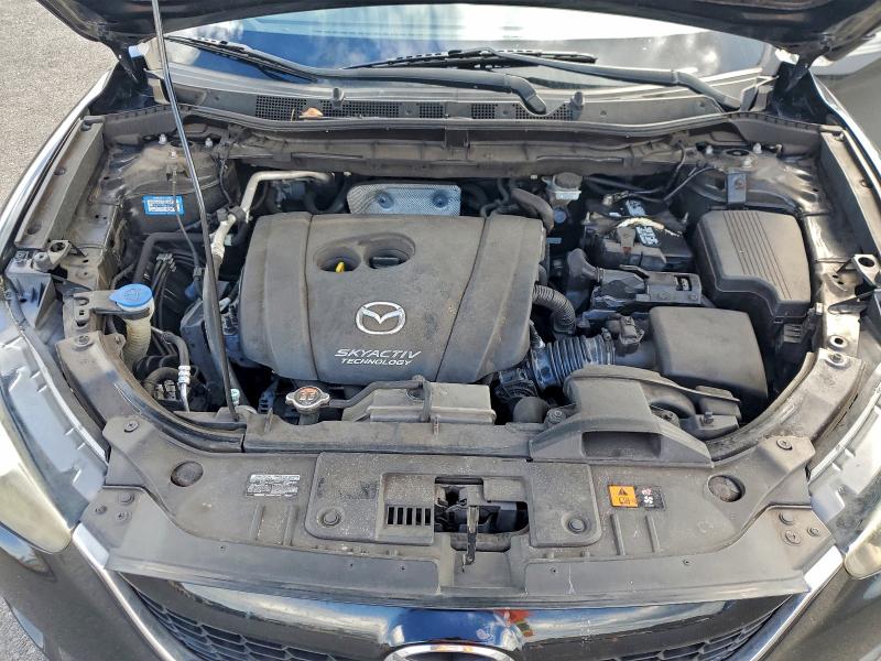 Photo 12 from auction – 2014 MAZDA CX-5 SPORT with VIN JM3KE2BE1E0409797