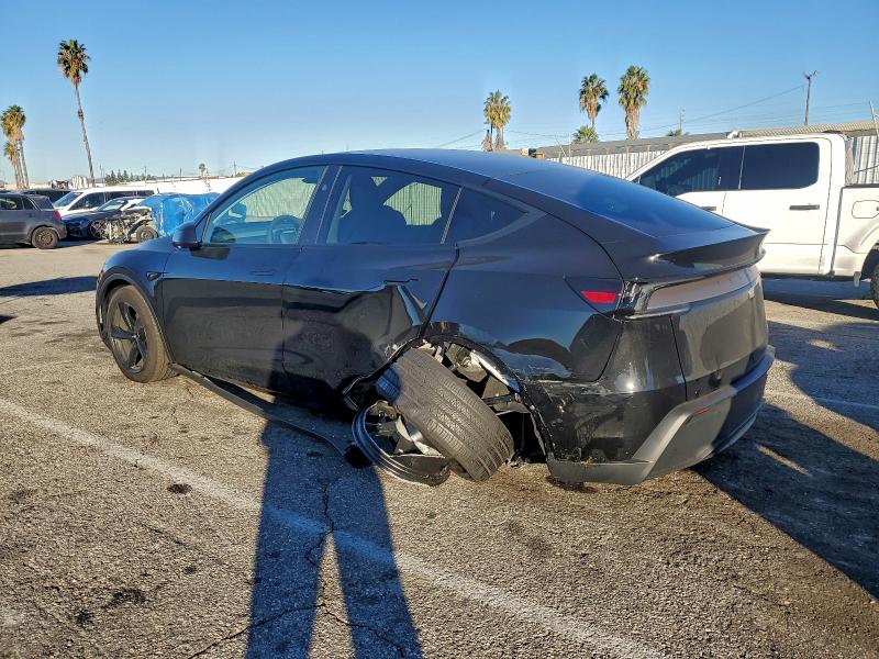 Photo 2 from auction – 2026 TESLA MODEL Y with VIN 7SAYGDED2TF523689