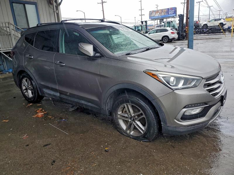 Photo 4 from auction – 2017 HYUNDAI SANTA FE S with VIN 5NMZU3LB0HH016589