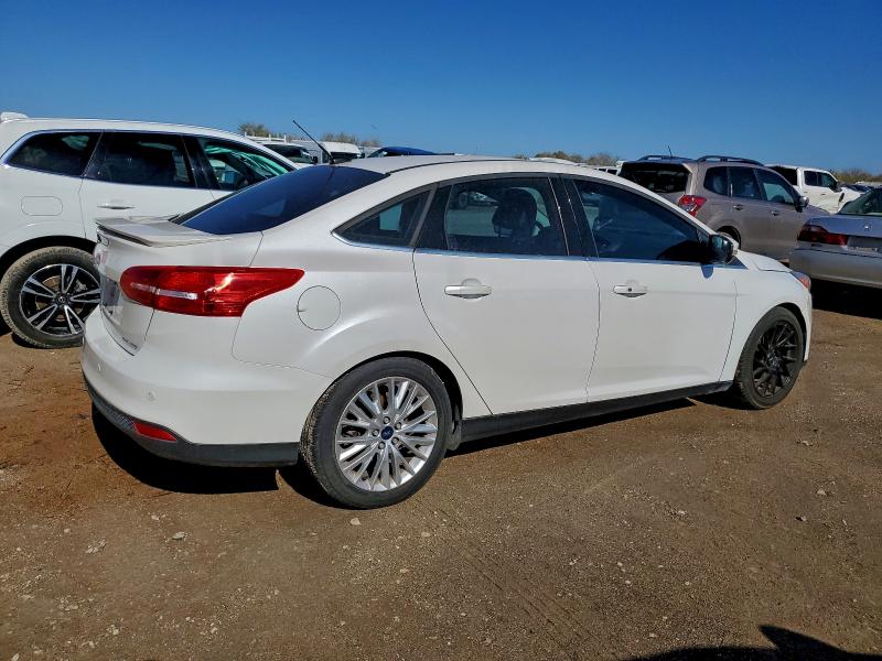 Photo 3 from auction – 2017 FORD FOCUS TITA with VIN 1FADP3J20HL284065