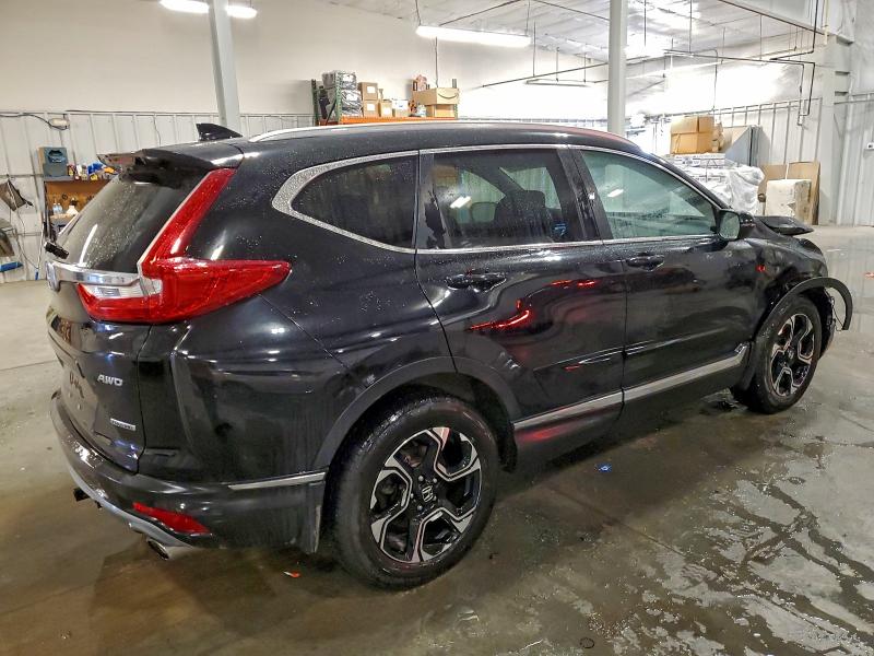 Photo 3 from auction – 2018 HONDA CR-V TOURI with VIN 7FARW2H97JE014411