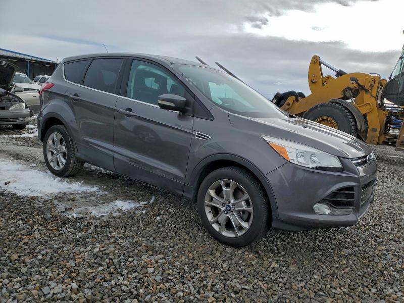 Photo 4 from auction – 2013 FORD ESCAPE SEL with VIN 1FMCU0H98DUA94501