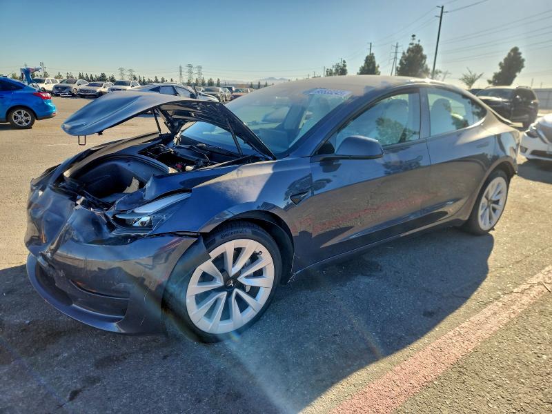 TESLA MODEL 3 2022 with VIN 5YJ3E1EA2NF372888 - Photo from auction
