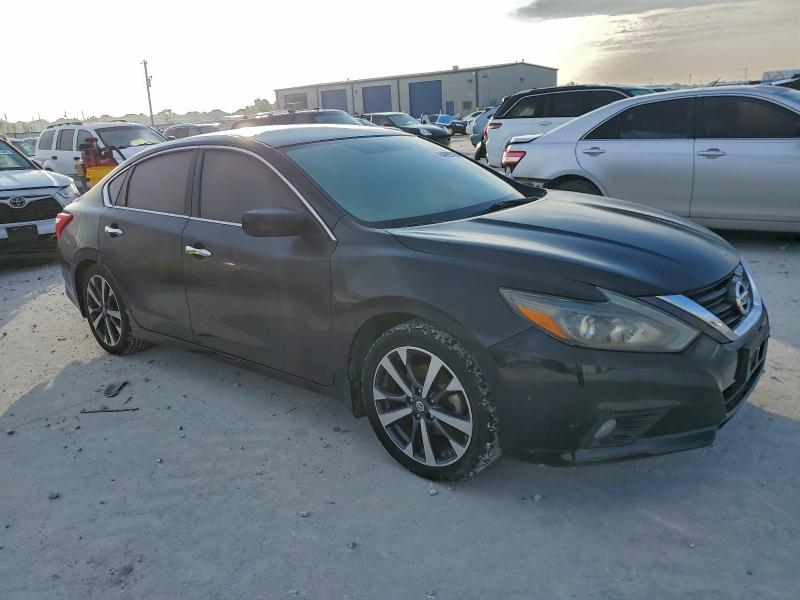 Photo 4 from auction – 2016 NISSAN ALTIMA 2.5 with VIN 1N4AL3AP1GN384091