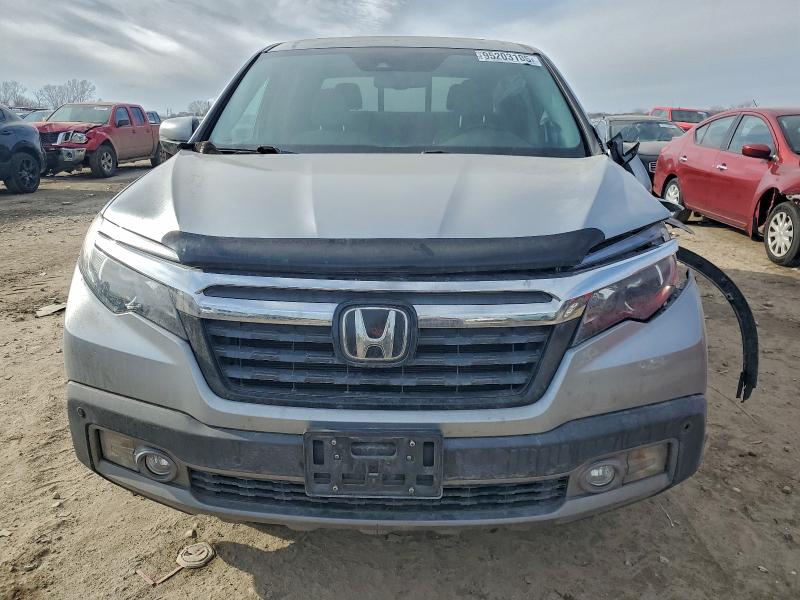 Photo 5 from auction – 2019 HONDA RIDGELINE with VIN 5FPYK3F76KB016797