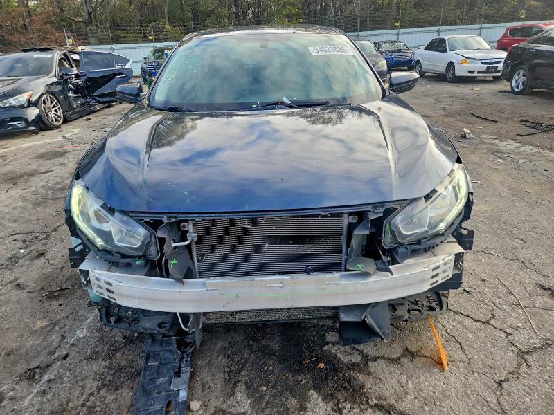 Photo 5 from auction – 2017 HONDA CIVIC EX with VIN 19XFC2F72HE004572