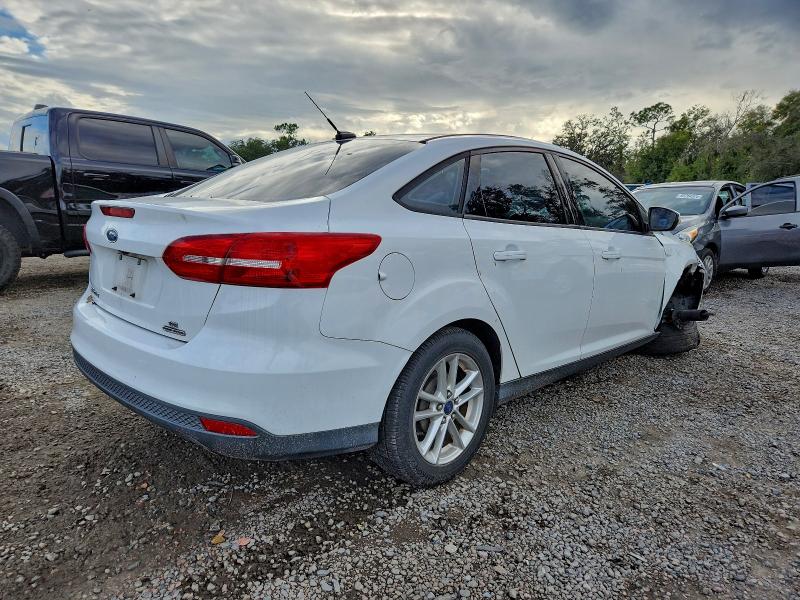 Photo 3 from auction – 2016 FORD FOCUS SE with VIN 1FADP3F27GL231581