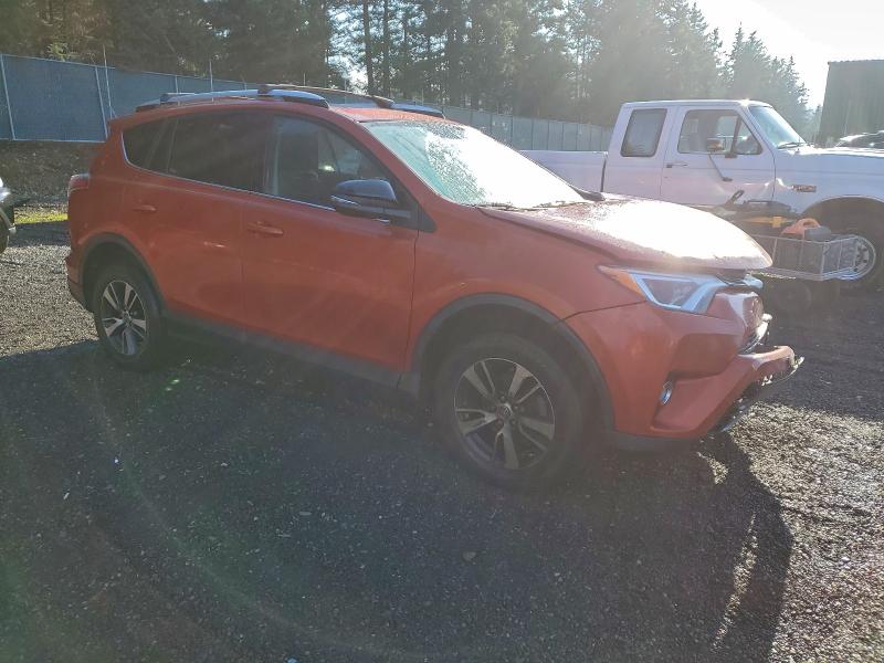 Photo 4 from auction – 2016 TOYOTA RAV4 XLE with VIN 2T3RFREVXGW481220