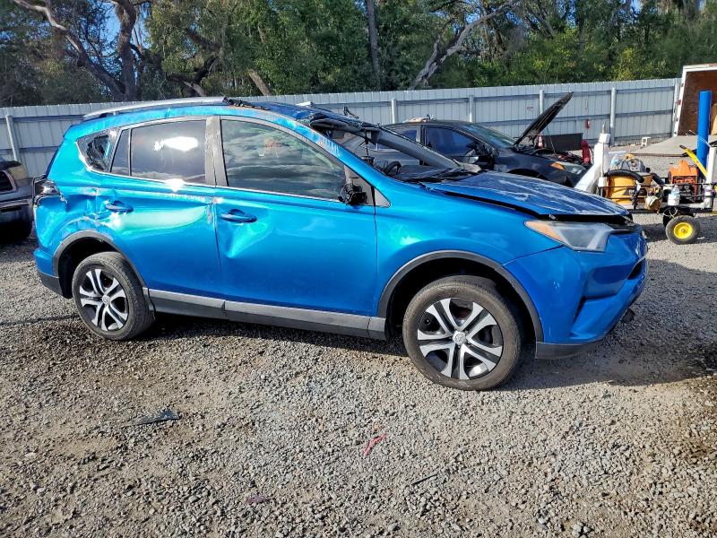 Photo 4 from auction – 2018 TOYOTA RAV4 with VIN JTMZFREV5JJ195698