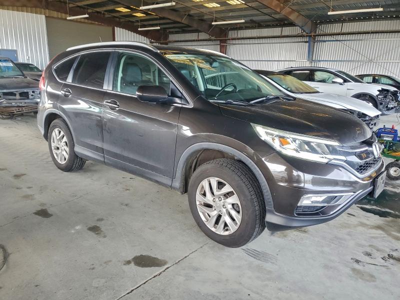 Photo 4 from auction – 2016 HONDA CR-V EXL with VIN 2HKRM4H79GH650091