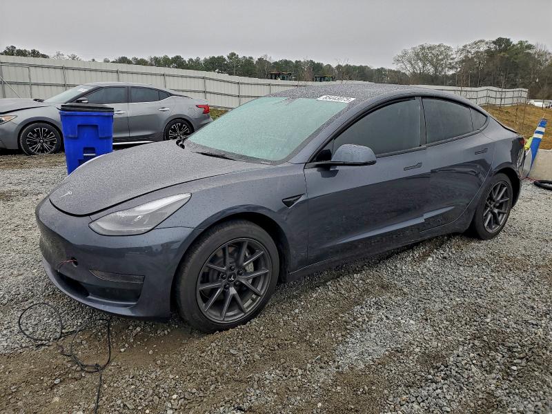 TESLA MODEL 3 2023 with VIN 5YJ3E1EA3PF420207 - Photo from auction