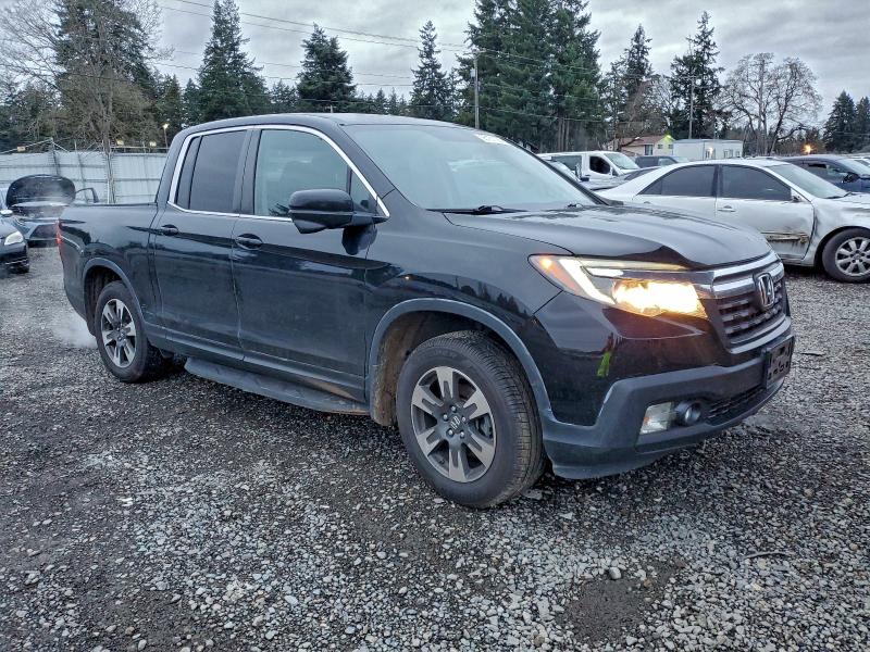 Photo 4 from auction – 2017 HONDA RIDGELINE with VIN 5FPYK3F61HB004086