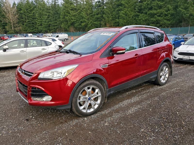 FORD ESCAPE TIT 2014 with VIN 1FMCU0JX1EUD49452 - Photo from auction
