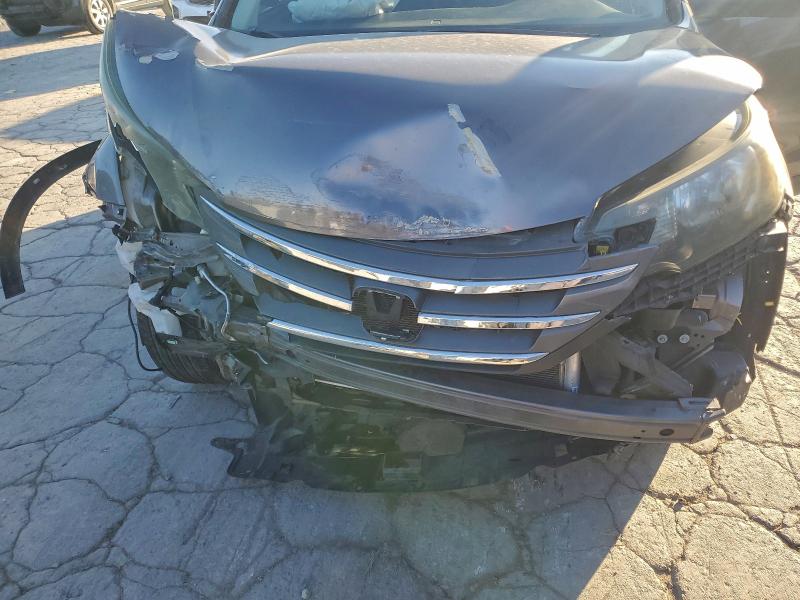 Photo 11 from auction – 2013 HONDA CR-V LX with VIN 5J6RM4H31DL080425
