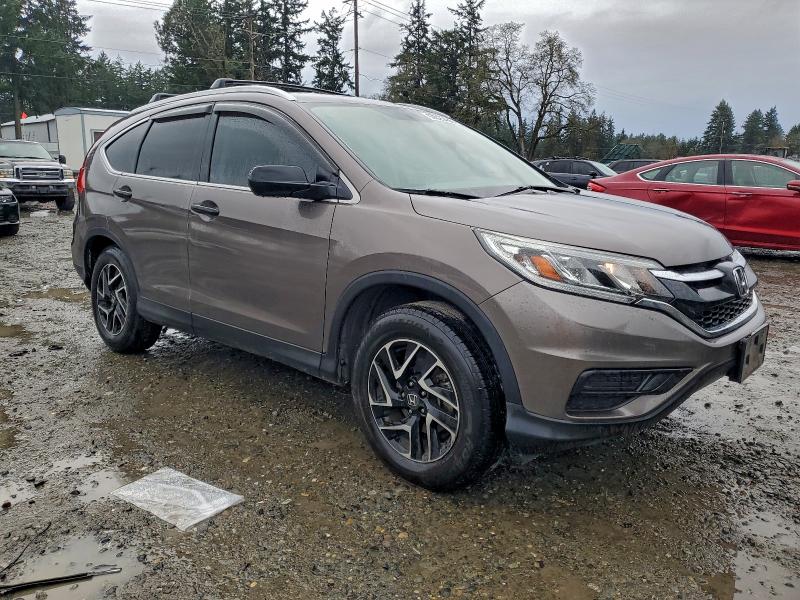 Photo 4 from auction – 2016 HONDA CR-V SE with VIN 2HKRM4H46GH662611