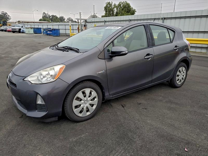 TOYOTA PRIUS C 2014 with VIN JTDKDTB36E1563285 - Photo from auction
