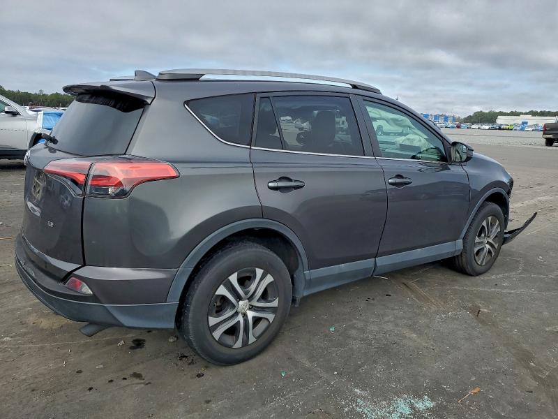 Photo 3 from auction – 2018 TOYOTA RAV4 LE with VIN 2T3ZFREV9JW452007
