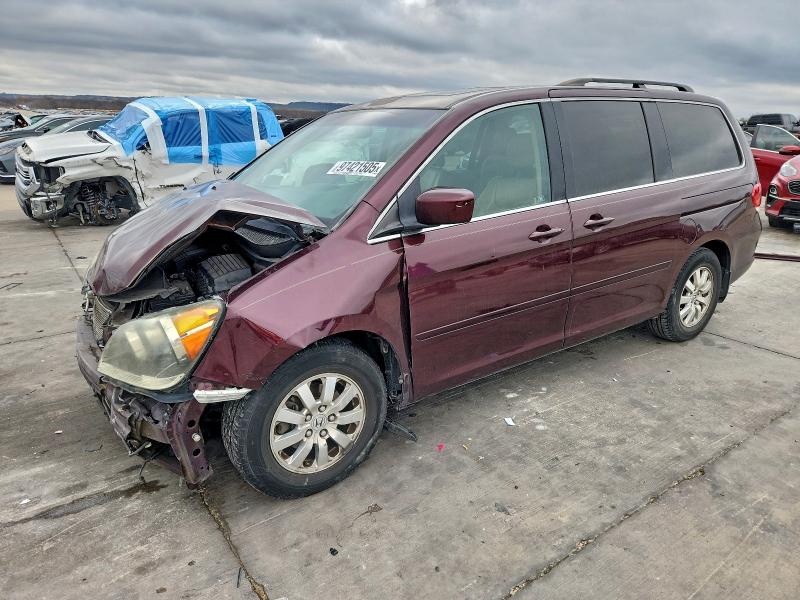 HONDA ODYSSEY EX 2010 with VIN 5FNRL3H77AB076156 - Photo from auction
