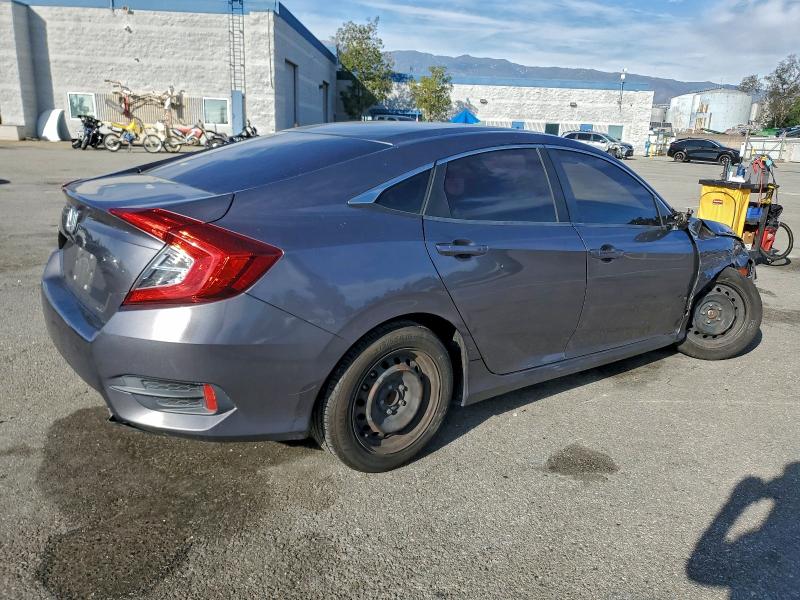 Photo 3 from auction – 2019 HONDA CIVIC with VIN 19XFC2F61KE203059