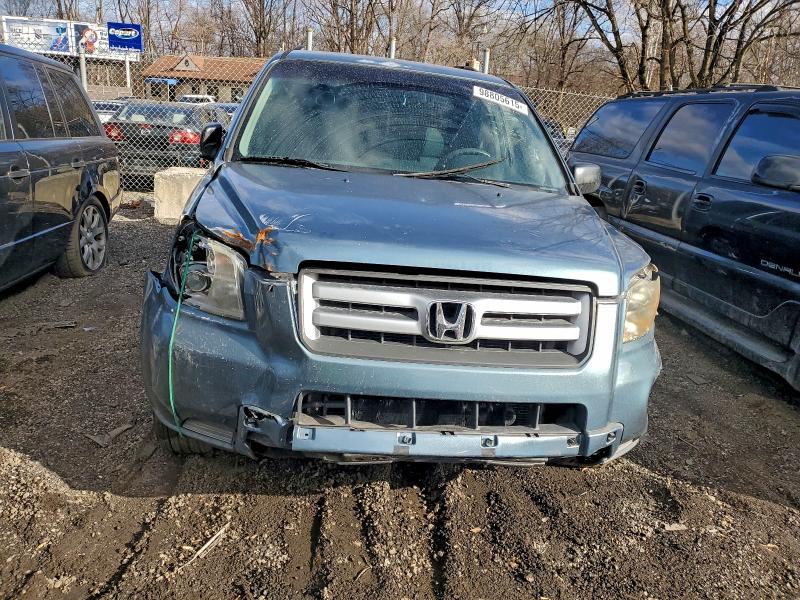 Photo 5 from auction – 2006 HONDA PILOT LX with VIN 5FNYF18126B027182