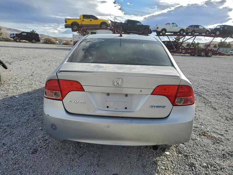 Photo 6 from auction – 2006 HONDA CIVIC HYBR with VIN JHMFA36296S001032
