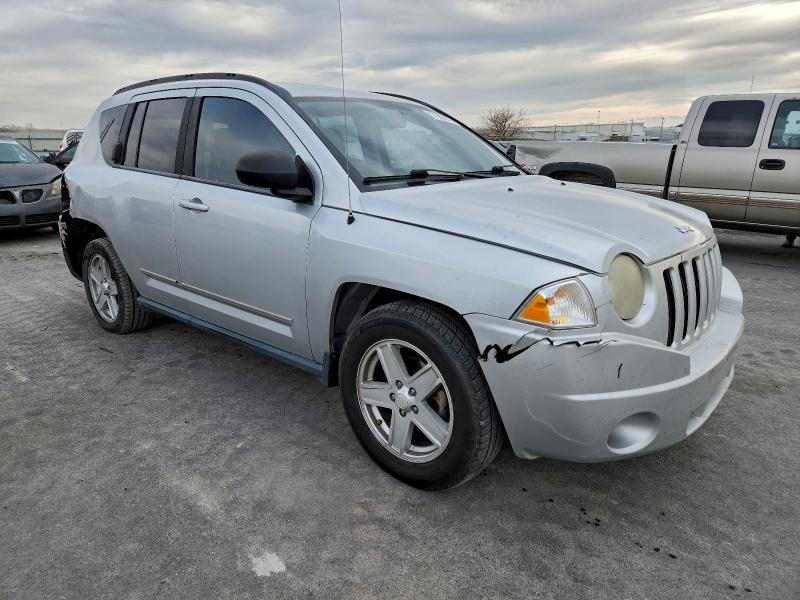 Photo 4 from auction – 2010 JEEP COMPASS SP with VIN 1J4NT4FB6AD554211