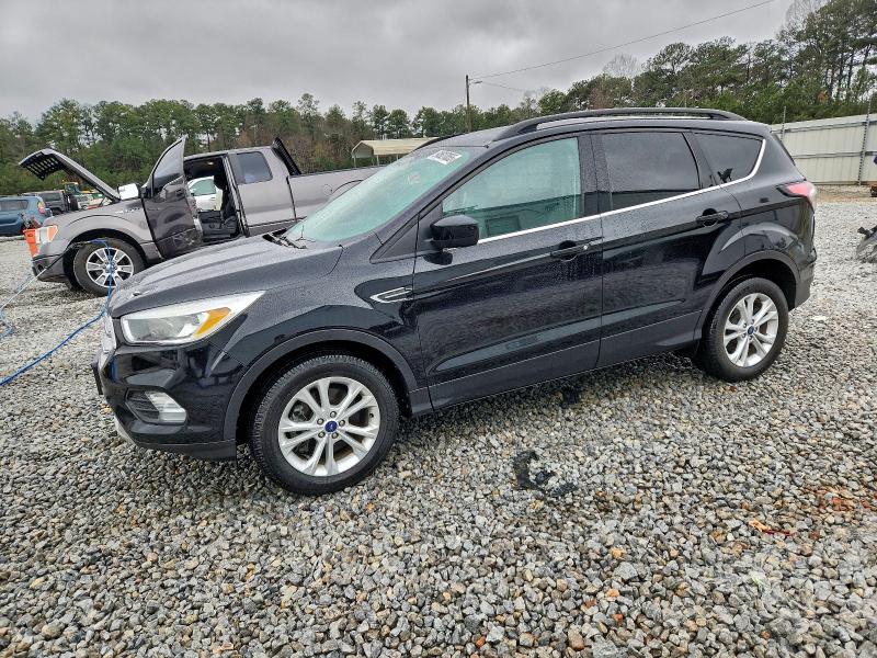 FORD ESCAPE SE 2018 with VIN 1FMCU9GD2JUA58261 - Photo from auction