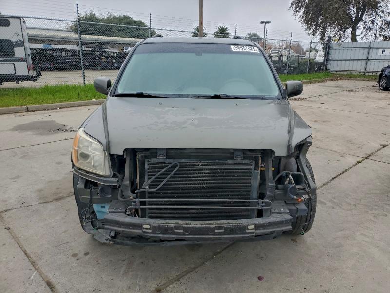 Photo 5 from auction – 2006 HONDA PILOT EX with VIN 5FNYF18586B029652
