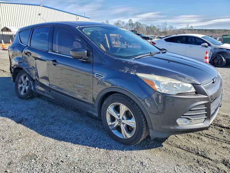 Photo 4 from auction – 2015 FORD ESCAPE SE with VIN 1FMCU0G9XFUB64651