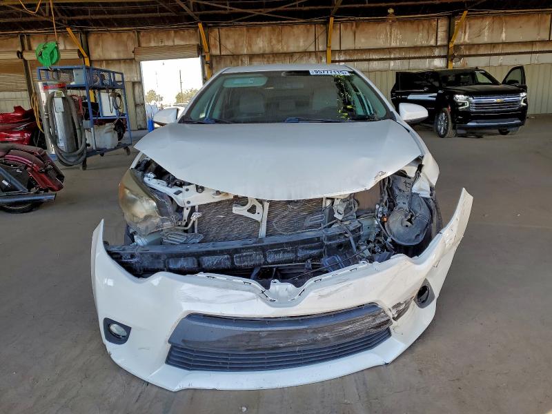 Photo 5 from auction – 2014 TOYOTA COROLLA EC with VIN 5YFBPRHE2EP074610
