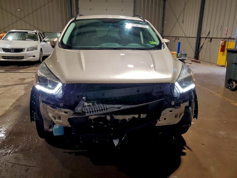 Photo 5 from auction – 2017 FORD ESCAPE with VIN 1FMCU9GD6HUC85642