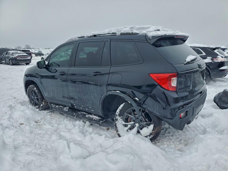 Photo 2 from auction – 2021 HONDA PASSPORT E with VIN 5FNYF8H09MB008271
