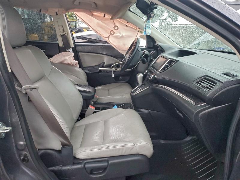 Photo 7 from auction – 2015 HONDA CR-V EXL with VIN 2HKRM3H75FH519930