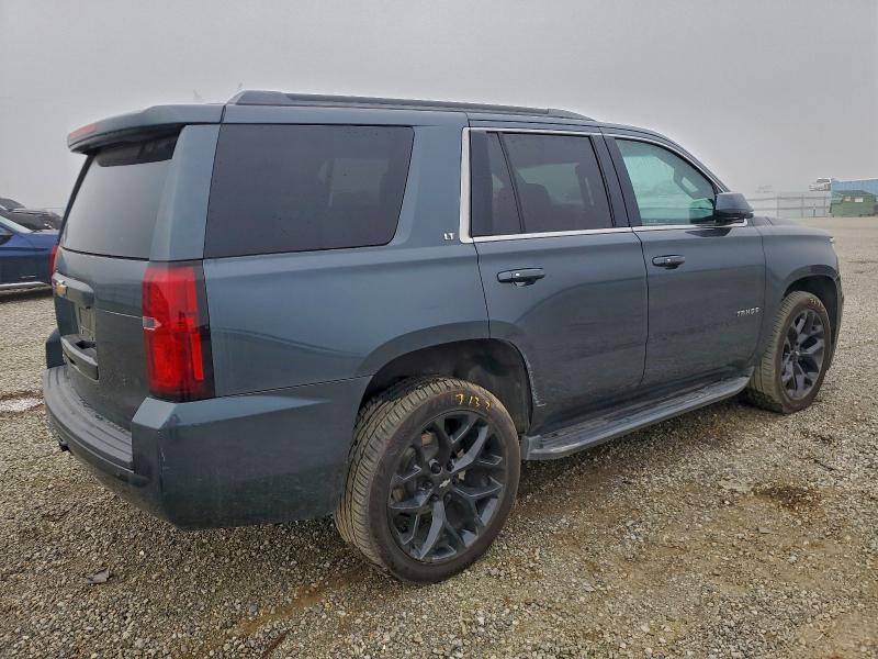 Photo 3 from auction – 2019 CHEVROLET TAHOE with VIN 1GNSKBKC8KR405650