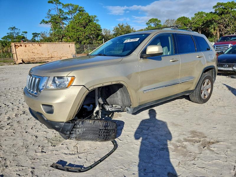 JEEP GRAND CHER 2011 with VIN 1J4RS4GG1BC574825 - Photo from auction