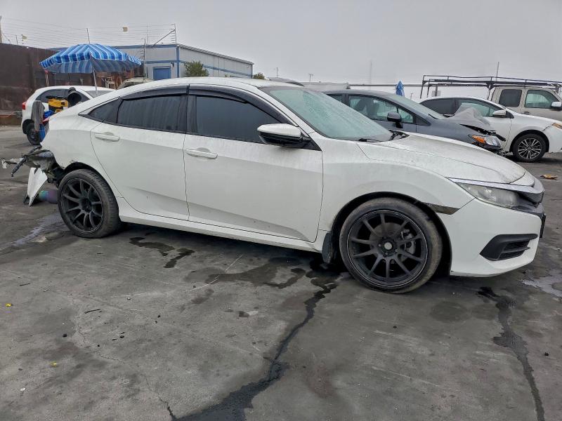 Photo 4 from auction – 2016 HONDA CIVIC LX with VIN 2HGFC2F53GH567956