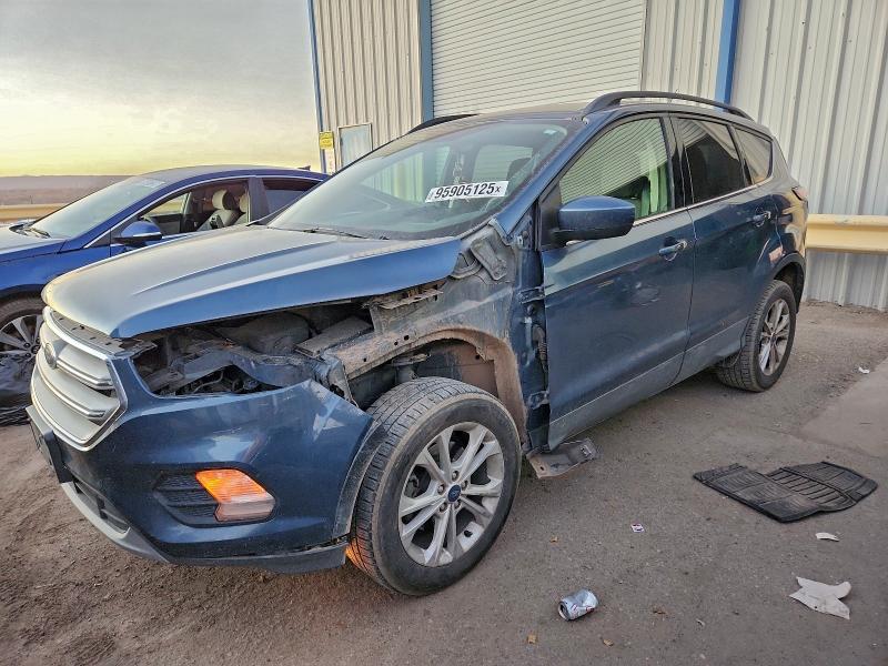 FORD ESCAPE SE 2018 with VIN 1FMCU0GD7JUC86722 - Photo from auction