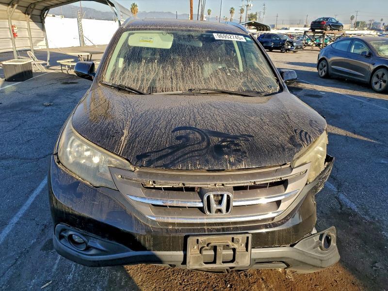 Photo 5 from auction – 2014 HONDA CR-V with VIN 2HKRM3H7XEH524815