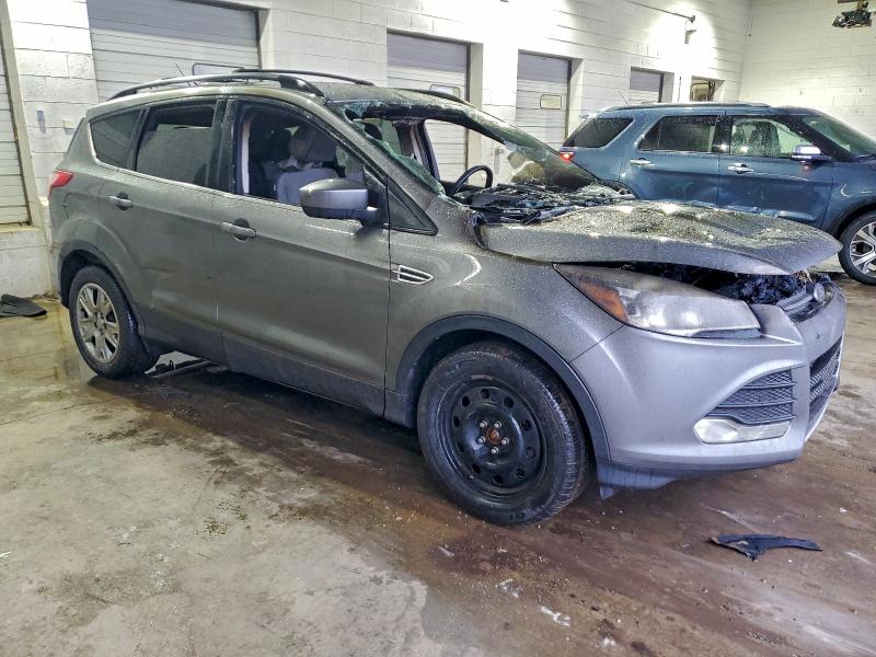 Photo 4 from auction – 2014 FORD ESCAPE with VIN 1FMCU0G93EUD34783