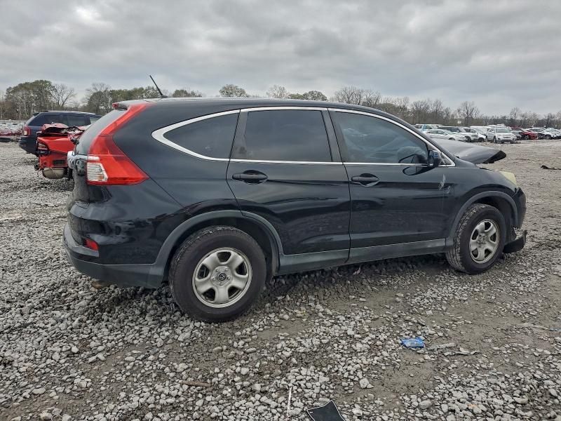 Photo 3 from auction – 2015 HONDA CR-V LX with VIN 2HKRM3H33FH558187
