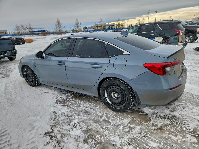 Photo 2 from auction – 2022 HONDA CIVIC with VIN 2HGFE1F92NH007060