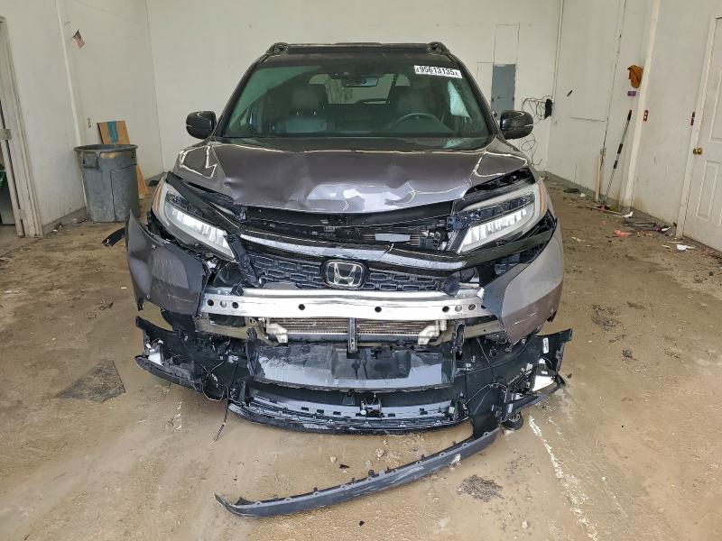 Photo 5 from auction – 2019 HONDA PASSPORT E with VIN 5FNYF8H04KB004660