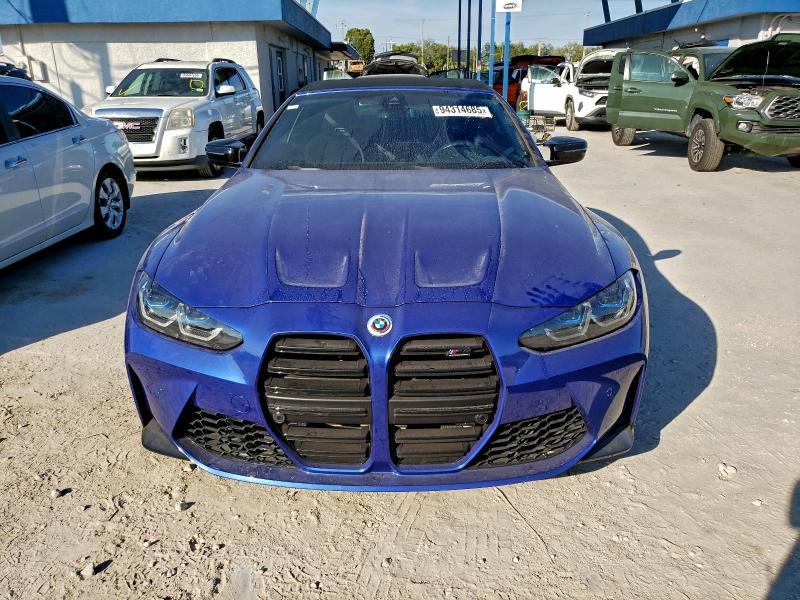 Photo 5 from auction – 2022 BMW M4 COMPETI with VIN WBS33BA07NCK66497
