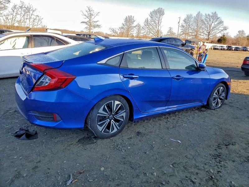 Photo 3 from auction – 2018 HONDA CIVIC EX with VIN JHMFC1F3XJX035872